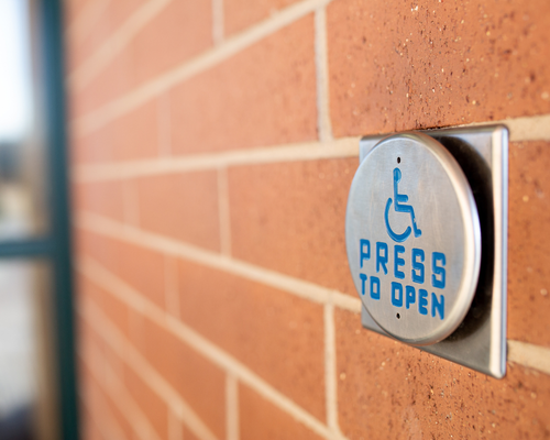 A button that says Press to Open, meant to open doors for accessibility
